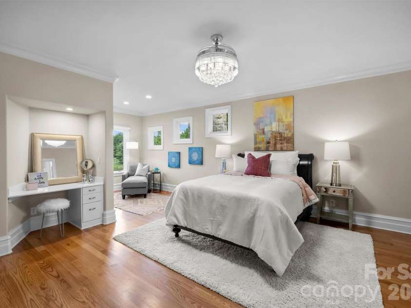 11717 Smart Lane, Charlotte, NC 28277.  MLS# CAR4403907, YatesRealty ID 39154. Generously sized bedroom with ensuite bath, built in desk, two closets, and that view!