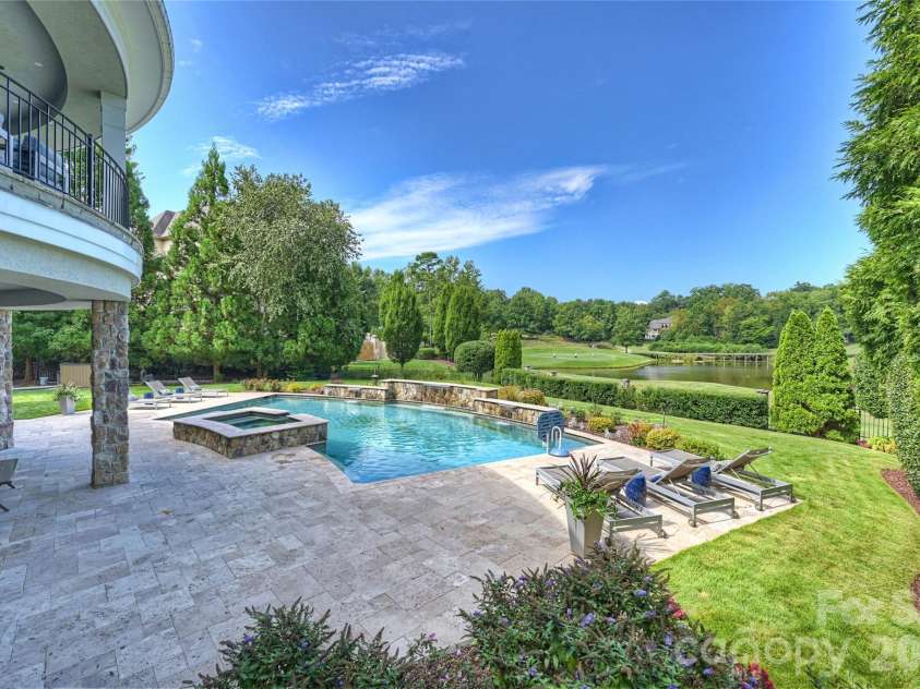 11717 Smart Lane, Charlotte, NC 28277.  MLS# CAR4403907, YatesRealty ID 39154. Stunning views from the travertine deck