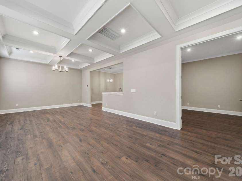 15009 Clear Sky Lane, Charlotte, NC 28277.  MLS# CAR4352286, YatesRealty ID 3916. Great room/ Dining/ Library/Office 
