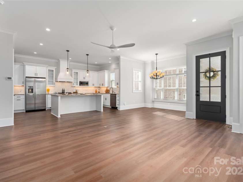 805 Naples Drive, Davidson, NC 28036.  MLS# CAR4296494, YatesRealty ID 39165. Main House Great Room, Dining Area and Kitchen