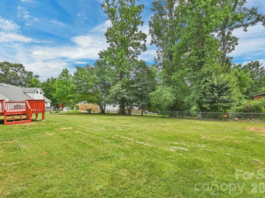 51 Jericho Ridge Road, Fletcher, NC 28732.  MLS# CAR4397516, YatesRealty ID 39177. Fenced back yard