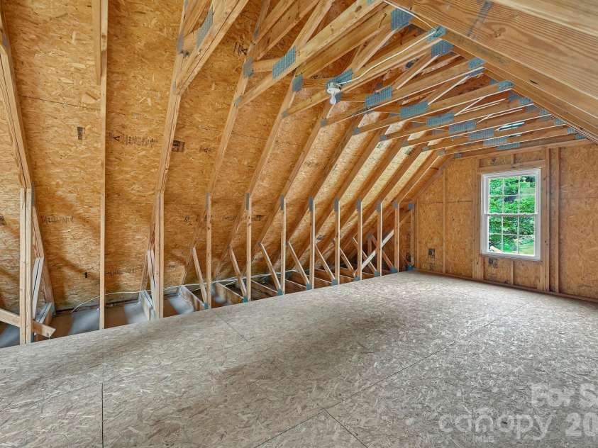 51 Jericho Ridge Road, Fletcher, NC 28732.  MLS# CAR4397516, YatesRealty ID 39177. Unfinished space above garage
