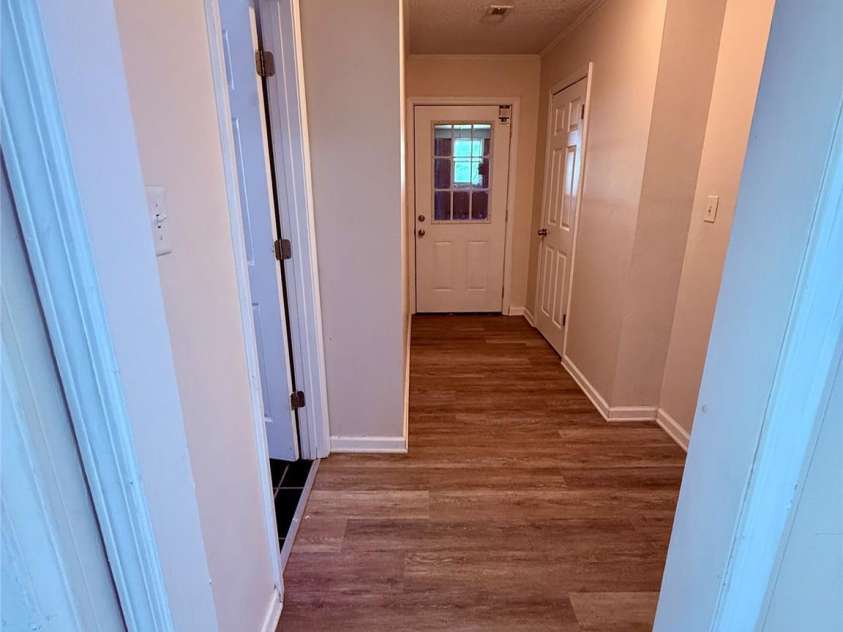 4209 Homeplace Drive, Shelby, NC 28152.  MLS# CAR4302755, YatesRealty ID 3918. Hallway to garage