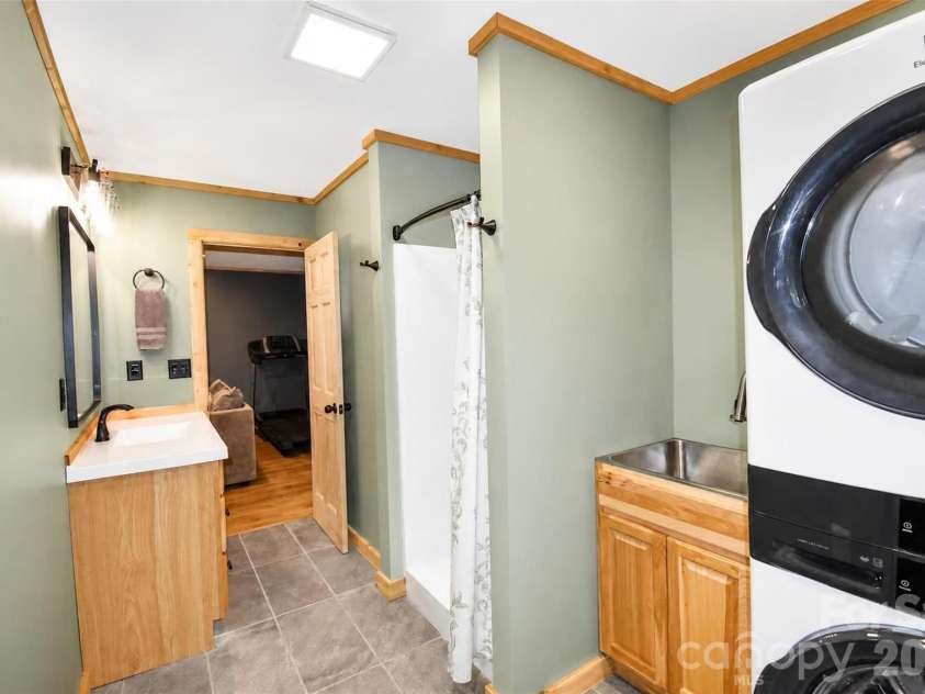 336 Hillside Road, Penrose, NC 28766.  MLS# CAR4405552, YatesRealty ID 39185. Basement bathroom with laundry