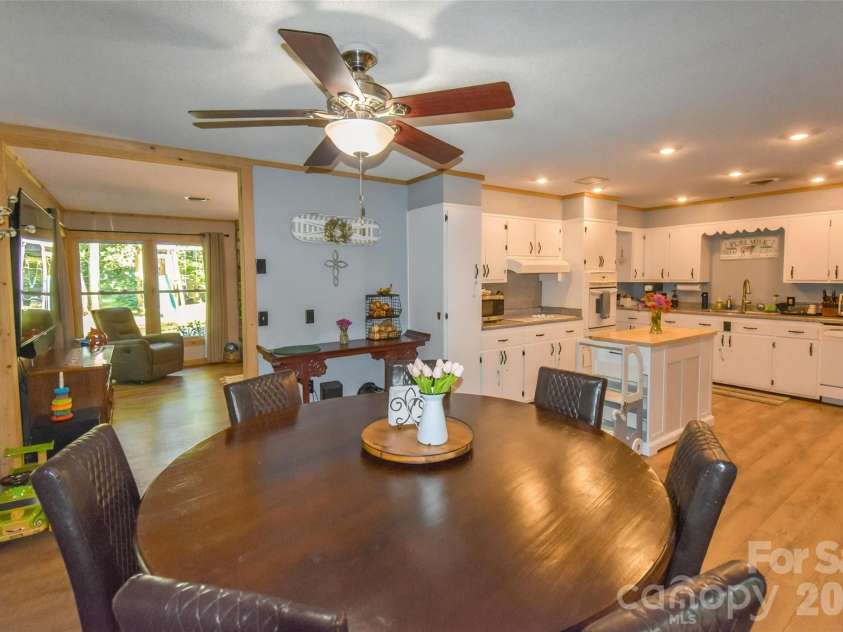 336 Hillside Road, Penrose, NC 28766.  MLS# CAR4405552, YatesRealty ID 39185. Dining looking toward kitchen