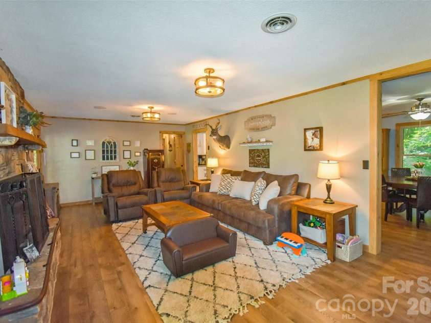 336 Hillside Road, Penrose, NC 28766.  MLS# CAR4405552, YatesRealty ID 39185. Dining room off living room