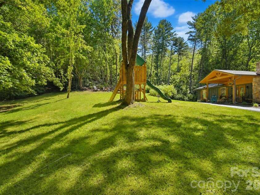 336 Hillside Road, Penrose, NC 28766.  MLS# CAR4405552, YatesRealty ID 39185. Nice yard for kids or pets
