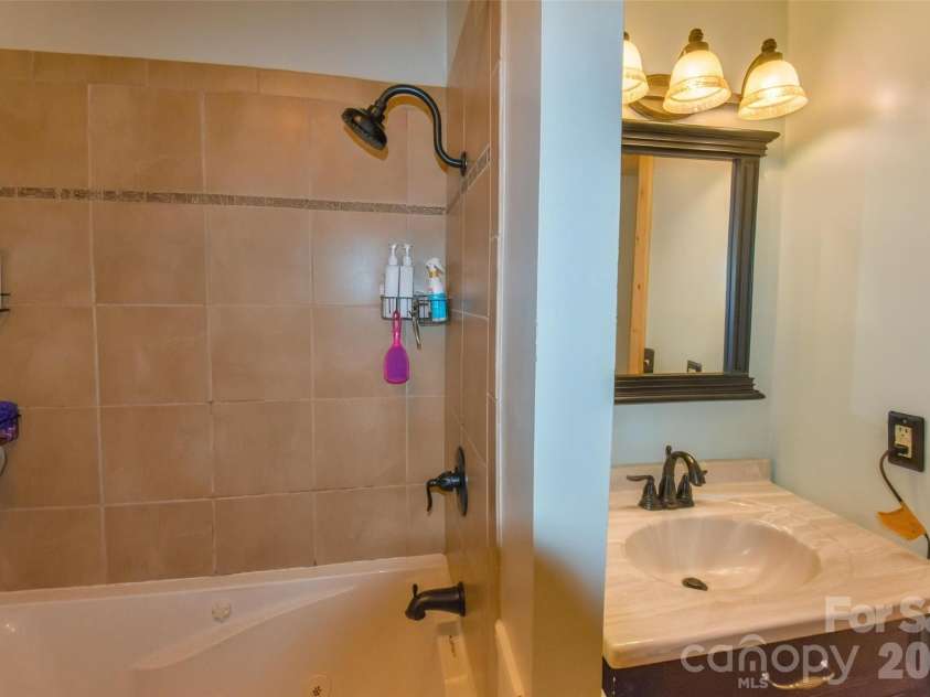 336 Hillside Road, Penrose, NC 28766.  MLS# CAR4405552, YatesRealty ID 39185. Primary bath