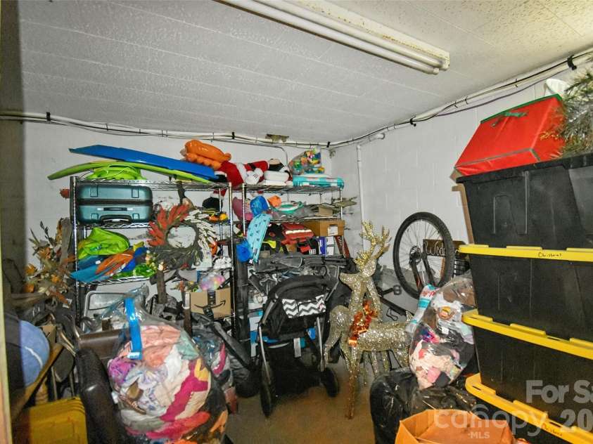 336 Hillside Road, Penrose, NC 28766.  MLS# CAR4405552, YatesRealty ID 39185. Storage room in basement