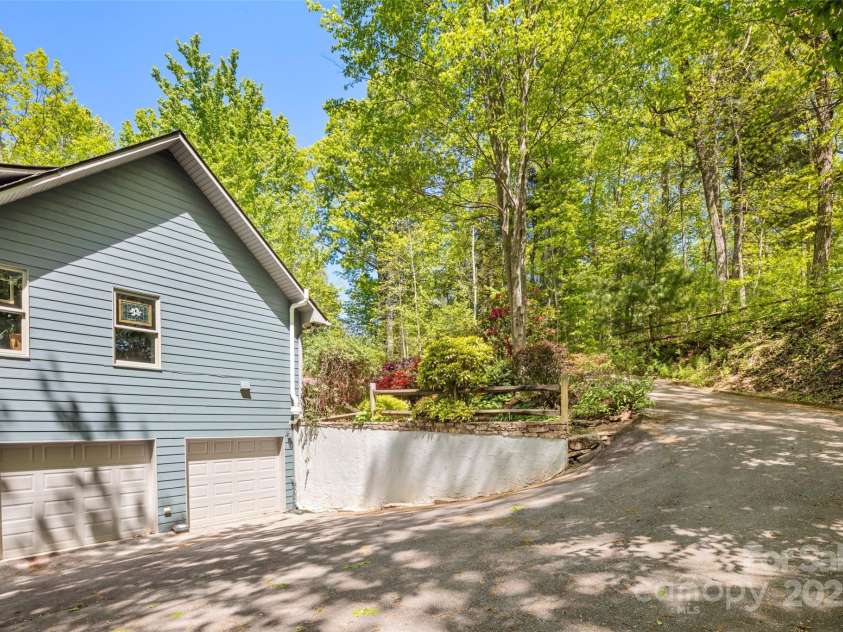 270 Ridge Drive, Saluda, NC 28773.  MLS# CAR4132159, YatesRealty ID 3919. 2-car garage has space for all of your toys.