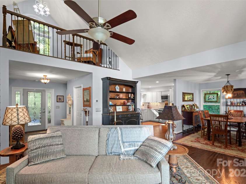 270 Ridge Drive, Saluda, NC 28773.  MLS# CAR4132159, YatesRealty ID 3919. An inviting open floor plan seamlessly connects indoor & outdoor living spaces w/ abundant natural light.
