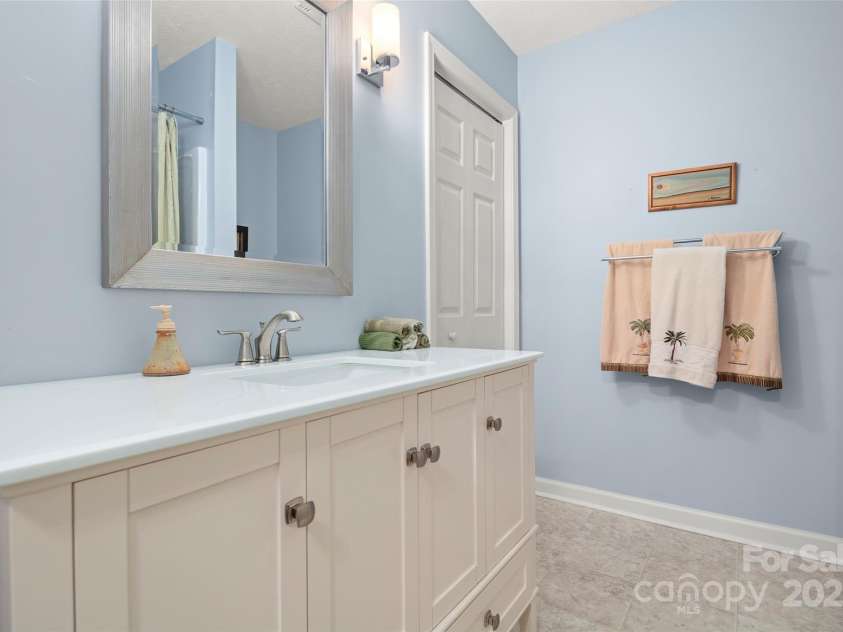 270 Ridge Drive, Saluda, NC 28773.  MLS# CAR4132159, YatesRealty ID 3919. Lower level bathroom