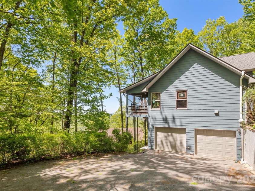 270 Ridge Drive, Saluda, NC 28773.  MLS# CAR4312875, YatesRealty ID 3919. Double garage in basement