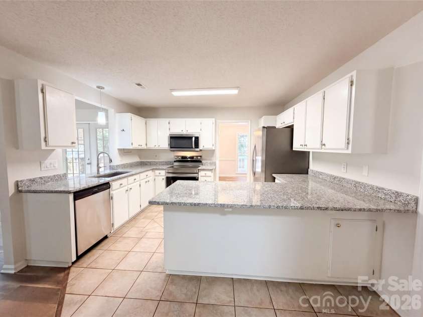 13622 Tynecastle Lane, Matthews, NC 28105.  MLS# CAR4378462, YatesRealty ID 39213. 