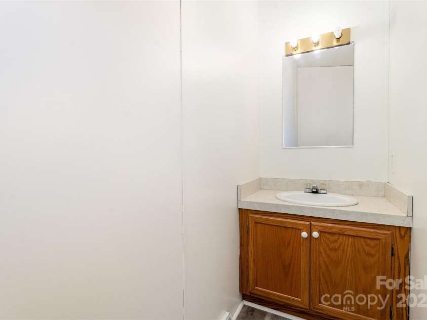 495 Brumley Road, Mooresville, NC 28115.  MLS# CAR4309551, YatesRealty ID 3923. Half bath