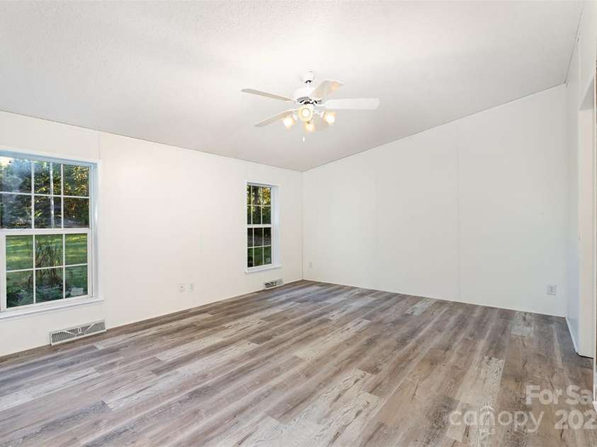 495 Brumley Road, Mooresville, NC 28115.  MLS# CAR4309551, YatesRealty ID 3923. Primary bedroom