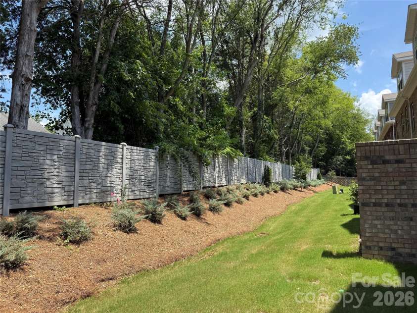 12065 Lavinia Lane, Charlotte, NC 28277.  MLS# CAR4284718, YatesRealty ID 39235. Beautiful tree lined backyard