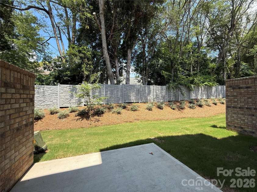 12065 Lavinia Lane, Charlotte, NC 28277.  MLS# CAR4284718, YatesRealty ID 39235. Brick privacy walls between each home