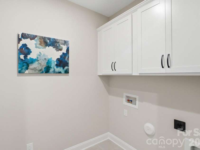 12123 Lavinia Lane, Charlotte, NC 28277.  MLS# CAR4420898, YatesRealty ID 39236. 1st floor laundry has space for more cabinets or refrigerator