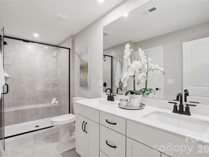 12123 Lavinia Lane, Charlotte, NC 28277.  MLS# CAR4420898, YatesRealty ID 39236. 3rd floor bath with dual vanities and walk in closet