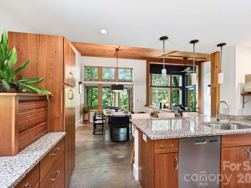 253 Edgewood Road, Asheville, NC 28804.  MLS# CAR4401448, YatesRealty ID 39237. Kitchen effortlessly flows into the dining area.