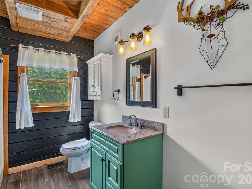 4551 Lake Adger Parkway, Mill Spring, NC 28756.  MLS# CAR4401928, YatesRealty ID 39249. Hall Bath