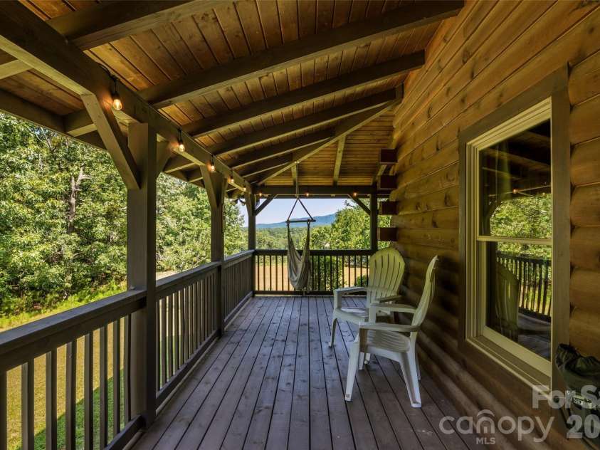 4551 Lake Adger Parkway, Mill Spring, NC 28756.  MLS# CAR4401928, YatesRealty ID 39249. Mountain View from Porch