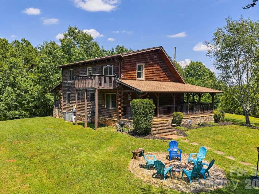 4551 Lake Adger Parkway, Mill Spring, NC 28756.  MLS# CAR4401928, YatesRealty ID 39249. Side and Rear View