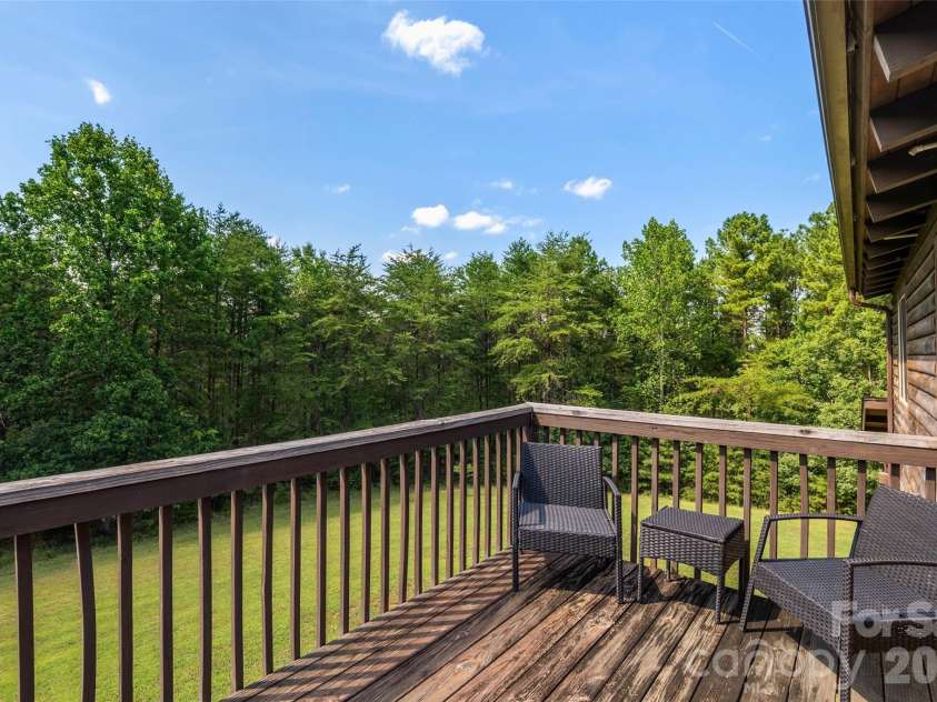 4551 Lake Adger Parkway, Mill Spring, NC 28756.  MLS# CAR4401928, YatesRealty ID 39249. Upper level deck outside Loft