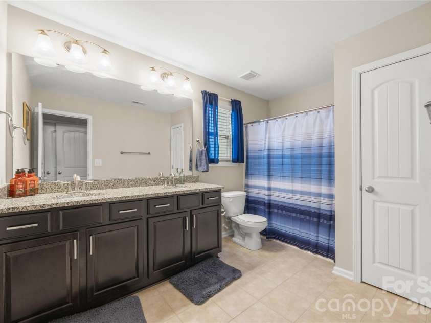 78029 Rillstone Drive, Lancaster, SC 29720.  MLS# CAR4404905, YatesRealty ID 39250. Upstairs Bathroom