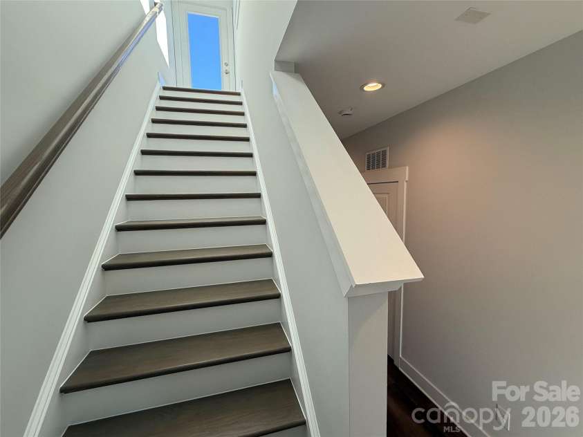 1229 34th Street, Charlotte, NC 28205.  MLS# CAR4211272, YatesRealty ID 3926. Stairs to Rooftop