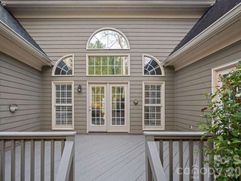 15919 Stonemont Road, Huntersville, NC 28078.  MLS# CAR4338152, YatesRealty ID 3927. Freshly sanded and restained rear deck, ready for immediate enjoyment.