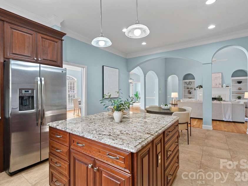15919 Stonemont Road, Huntersville, NC 28078.  MLS# CAR4338152, YatesRealty ID 3927. Well-appointed kitchen with excellent storage and functional layout.