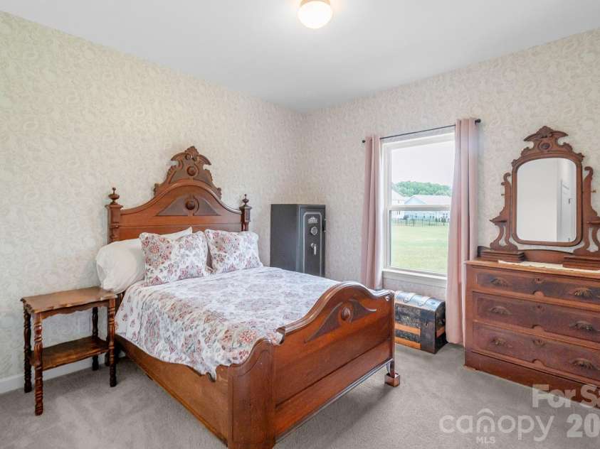 1046 Stone Marker Drive, Monroe, NC 28112.  MLS# CAR4406493, YatesRealty ID 39276. Main Floor Guestroom