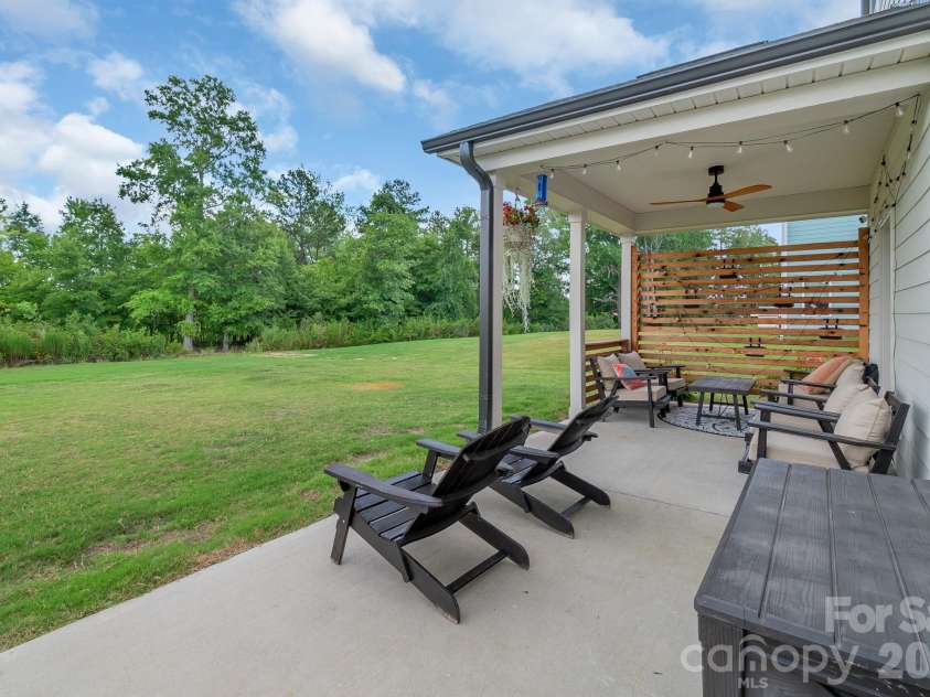 1046 Stone Marker Drive, Monroe, NC 28112.  MLS# CAR4406493, YatesRealty ID 39276. Porch with Private Backyard