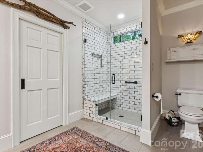 5121 Chillmark Road, Charlotte, NC 28226.  MLS# CAR4406043, YatesRealty ID 39281. Downstairs primary bath.