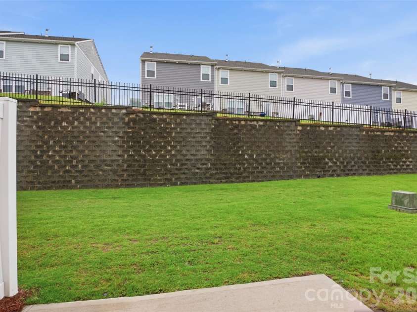6500 Kinder Lane, Lancaster, SC 29720.  MLS# CAR4393642, YatesRealty ID 39282. Back cement patio