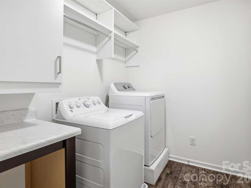 6500 Kinder Lane, Lancaster, SC 29720.  MLS# CAR4393642, YatesRealty ID 39282. Laundry room with folding table. Washer/dry do not convey