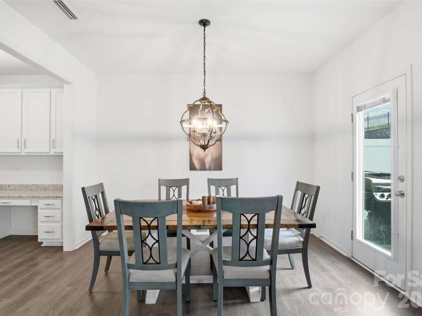 6500 Kinder Lane, Lancaster, SC 29720.  MLS# CAR4393642, YatesRealty ID 39282. Open concept Dining room with entry to back patio and computer niche to the left
