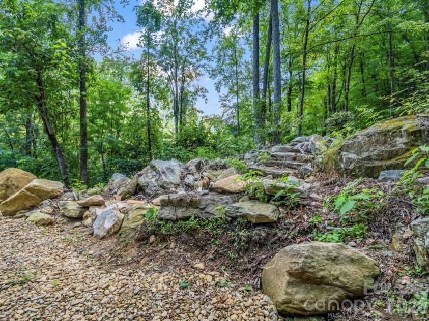 168 Fall Creek Drive, Chimney Rock, NC 28720.  MLS# CAR4407017, YatesRealty ID 39285. 