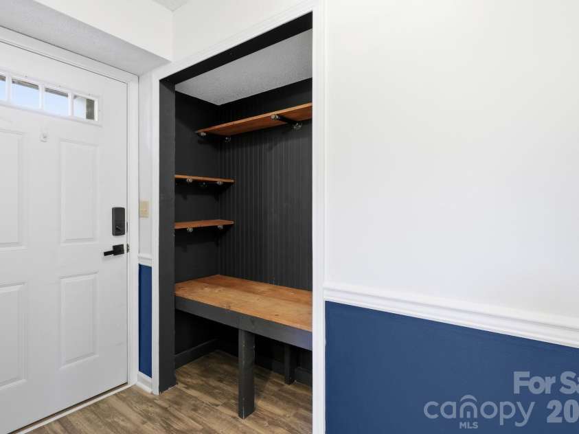 2705 Deermouse Way, Hendersonville, NC 28792.  MLS# CAR4404914, YatesRealty ID 39289. Built-In Entry Bench with Storage