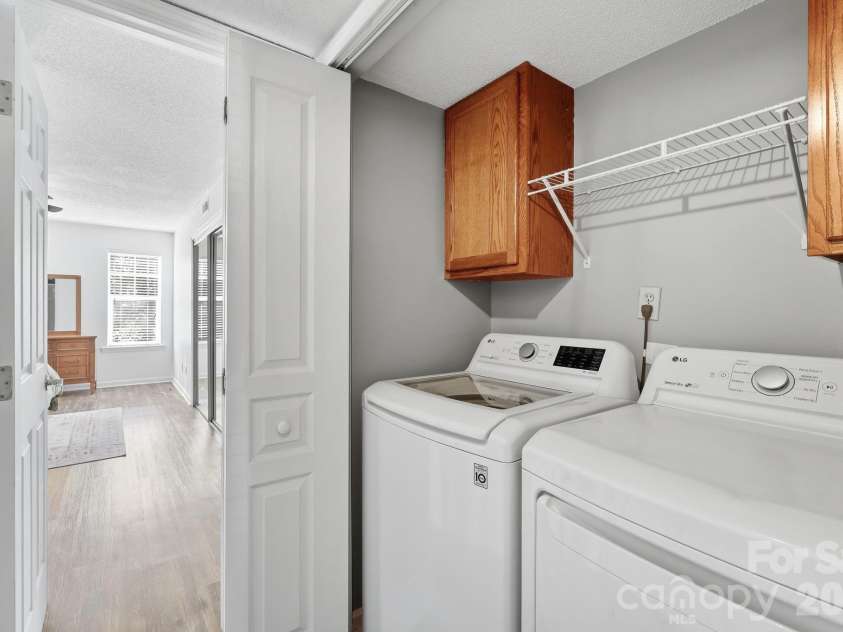 2705 Deermouse Way, Hendersonville, NC 28792.  MLS# CAR4404914, YatesRealty ID 39289. Laundry Closet in Hall