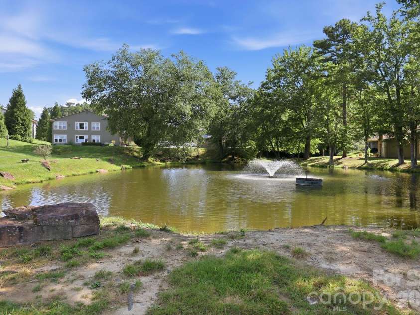2705 Deermouse Way, Hendersonville, NC 28792.  MLS# CAR4404914, YatesRealty ID 39289. Pond