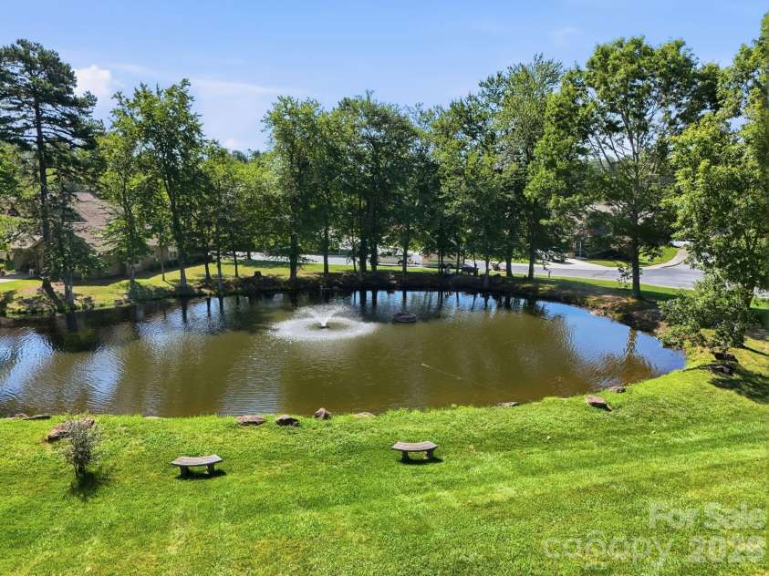 2705 Deermouse Way, Hendersonville, NC 28792.  MLS# CAR4404914, YatesRealty ID 39289. Pond