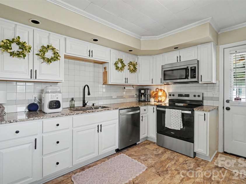 104 Pine Lane, Locust, NC 28097.  MLS# CAR4405368, YatesRealty ID 39297. 
