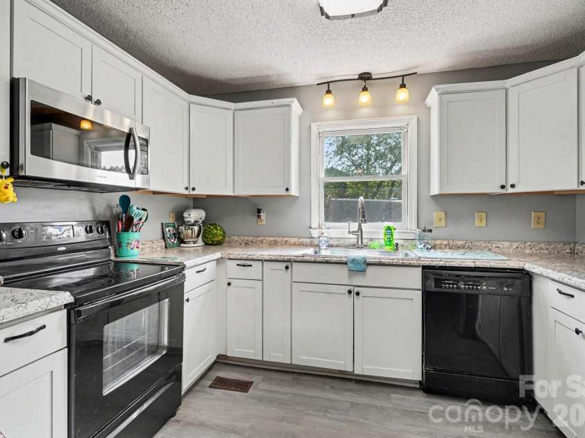 6021 Greyfield Drive, Monroe, NC 28110.  MLS# CAR4404813, YatesRealty ID 39303. 