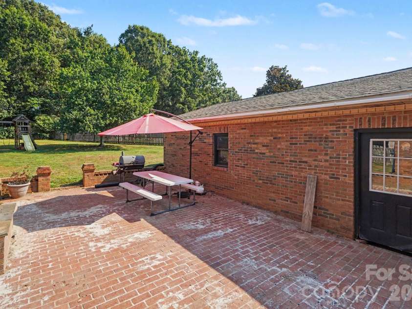 6021 Greyfield Drive, Monroe, NC 28110.  MLS# CAR4404813, YatesRealty ID 39303. 