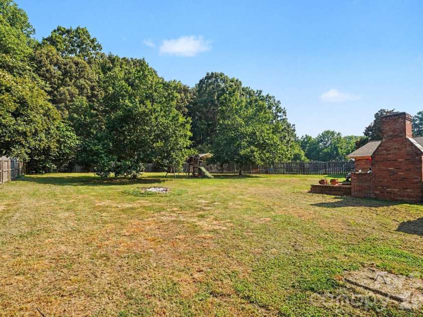 6021 Greyfield Drive, Monroe, NC 28110.  MLS# CAR4404813, YatesRealty ID 39303. 