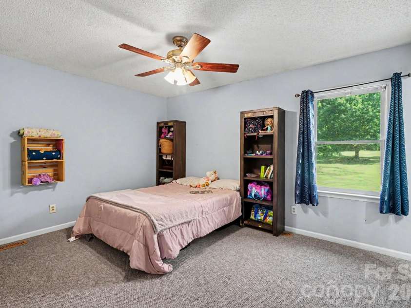 6021 Greyfield Drive, Monroe, NC 28110.  MLS# CAR4404813, YatesRealty ID 39303. Primary Bedroom