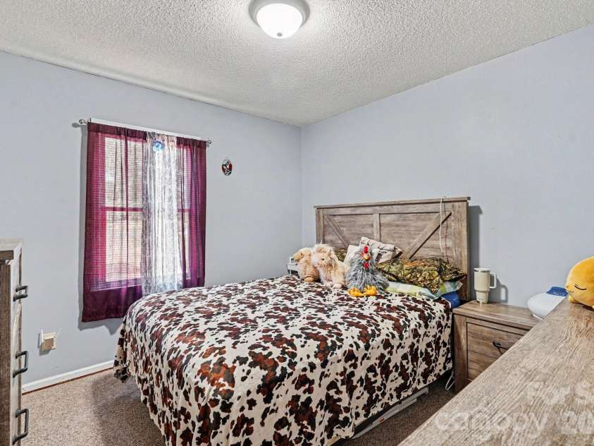 6021 Greyfield Drive, Monroe, NC 28110.  MLS# CAR4404813, YatesRealty ID 39303. Secondary Bedroom